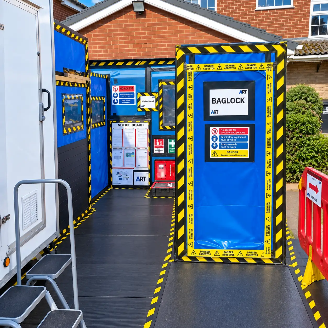 Decontamination unit and baglock outside a Stockport property during asbestos removal Asbestos Removal Team Ltd