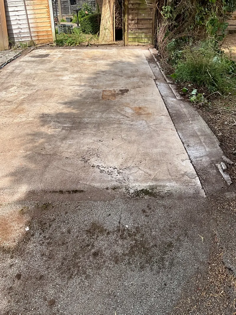Cleared garage base in Marple Stockport after asbestos removal and full clean down Asbestos Removal Team Ltd